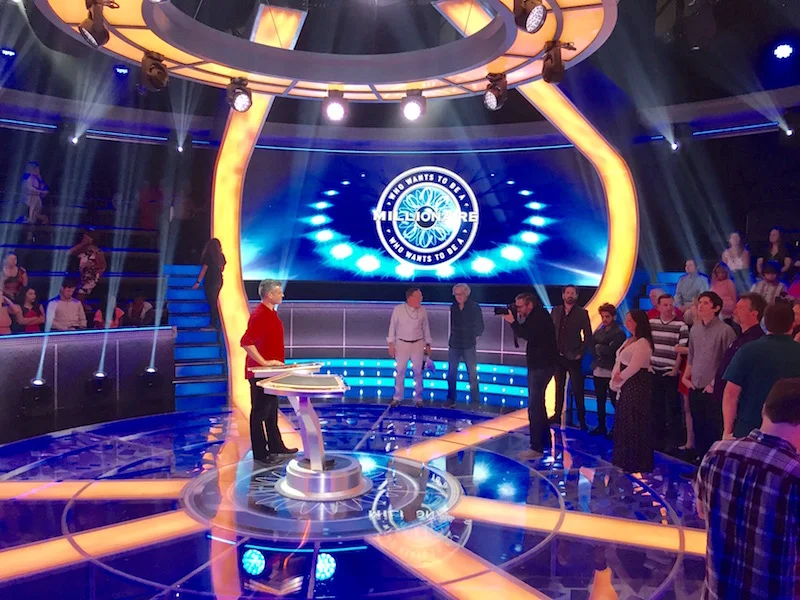 Host and guest of who wants to be a millionaire
